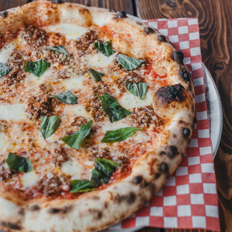 big feelings bolognese pizza at red bird brewing kelowna