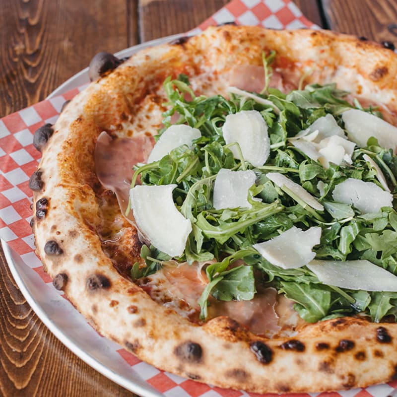 prosciutto & arugula pizza at red bird brewing, kelowna