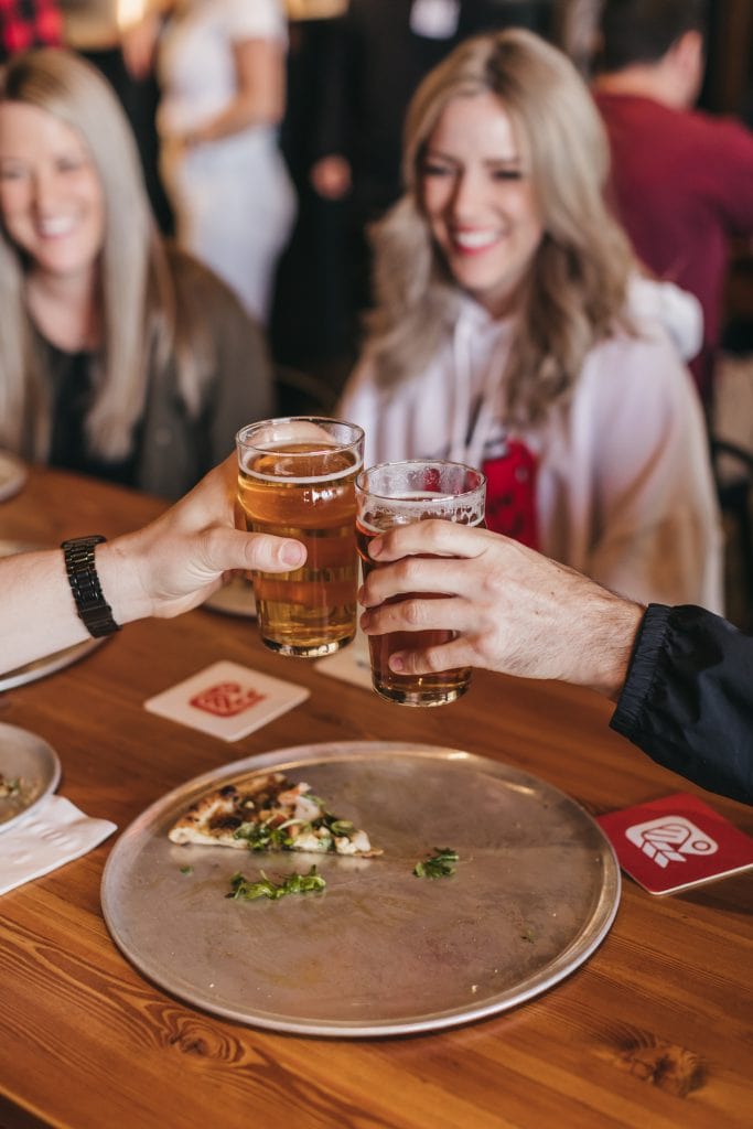 customers having beer at red bird brewing