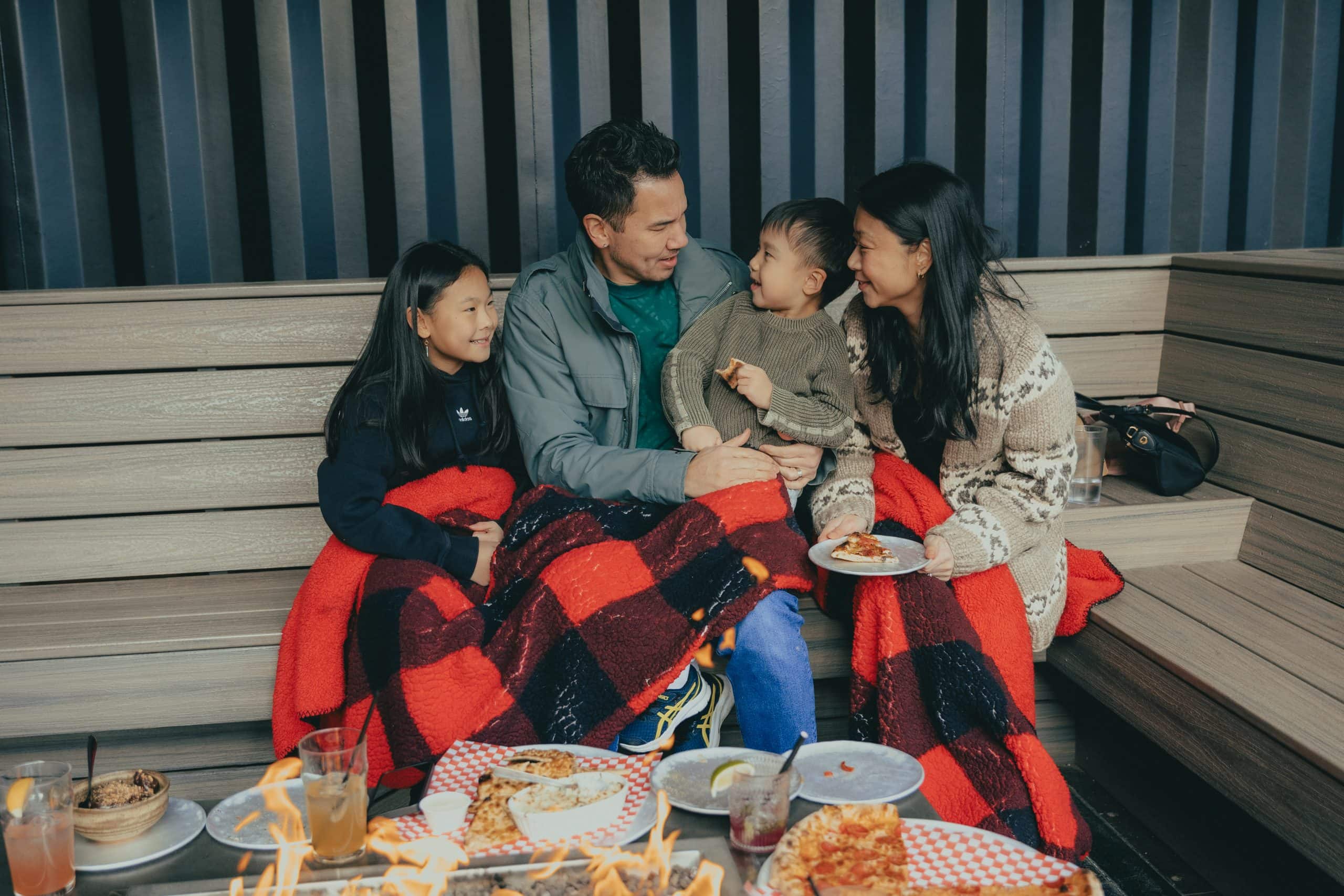 Family at Outdoor Fire Pits at Red Bird Brewing